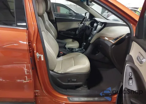 2015 Hyundai Santa Fe Sport 2.4L z USA, uszkodzony, nr VIN 5XYZU3LB2FG262339